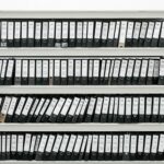 Contact Reports - Image of files in austere black binders