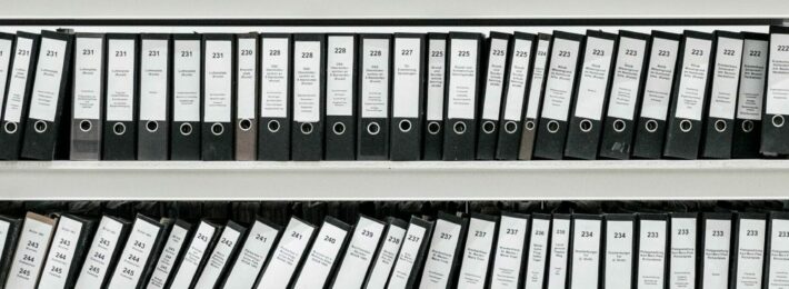 Contact Reports - Image of files in austere black binders