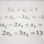 Remedial Math and Developmental Education: Image of an equation on a whiteboard