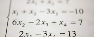 Remedial Math and Developmental Education: Image of an equation on a whiteboard