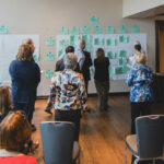 group of learners at an Academic Impressions conference