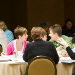 group of learners at an Academic Impressions conference