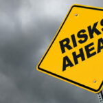 "Risks Ahead" Caution Roadsign