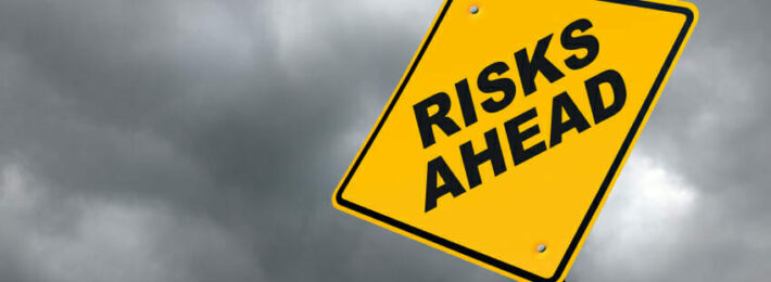"Risks Ahead" Caution Roadsign