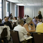 group of learners at an Academic Impressions conference