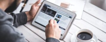 man reading a video course on a tablet