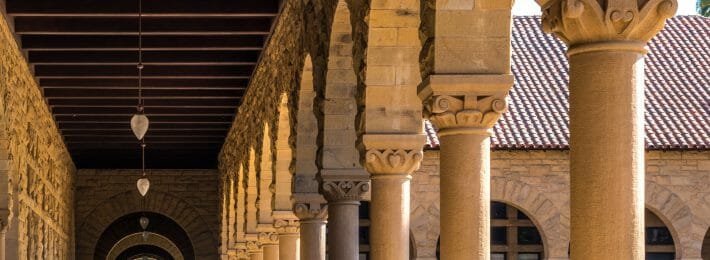 Small Colleges - Liberal Arts Colleges- Image showsStone arches on a campus dedicated to the liberal arts education