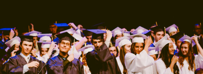 Students at a commencement ceremony