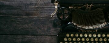 retro typewriter on a wooden surface