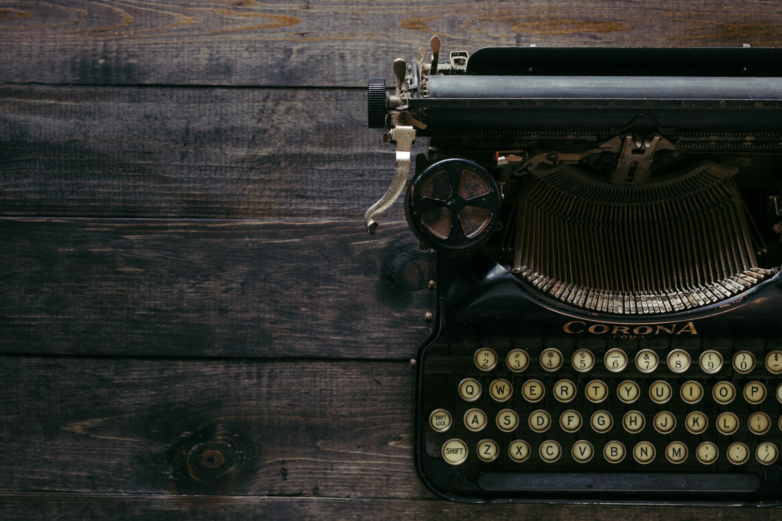 retro typewriter on a wooden surface