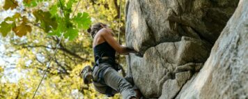 Risk Taking Women Leaders - Photo of a Woman Mountain Climbing