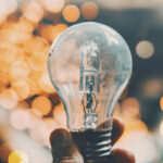 Innovation Center: Image of reflections on a light bulb