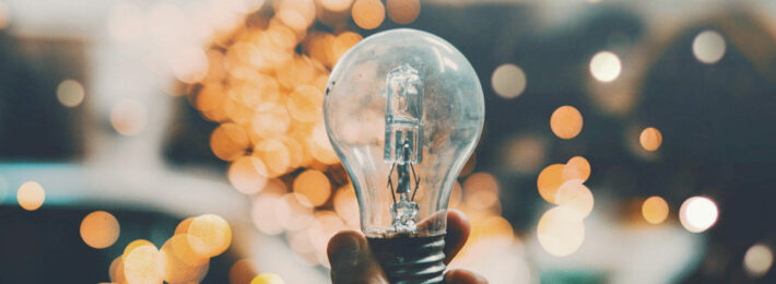 Innovation Center: Image of reflections on a light bulb