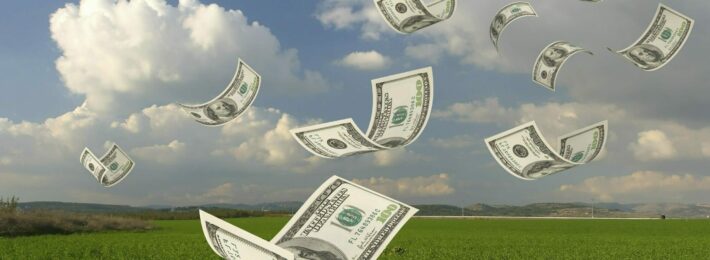 Funding for Innovation: Image of Dollar Bills Falling through the Air