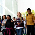 Image of a diverse group of students walking