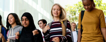 Image of a diverse group of students walking