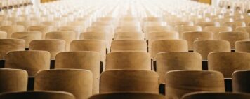 When the University President Exits Abruptly - Image of Empty Lecture Hall Chairs