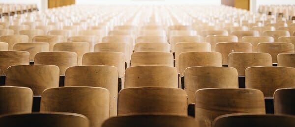 When the University President Exits Abruptly - Image of Empty Lecture Hall Chairs