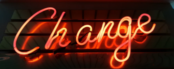 Neon sign spelling the word Change