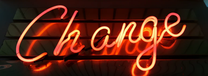 Neon sign spelling the word Change