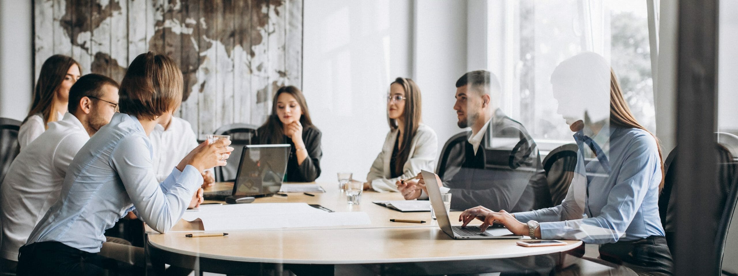 Group of people working out business plan in an office