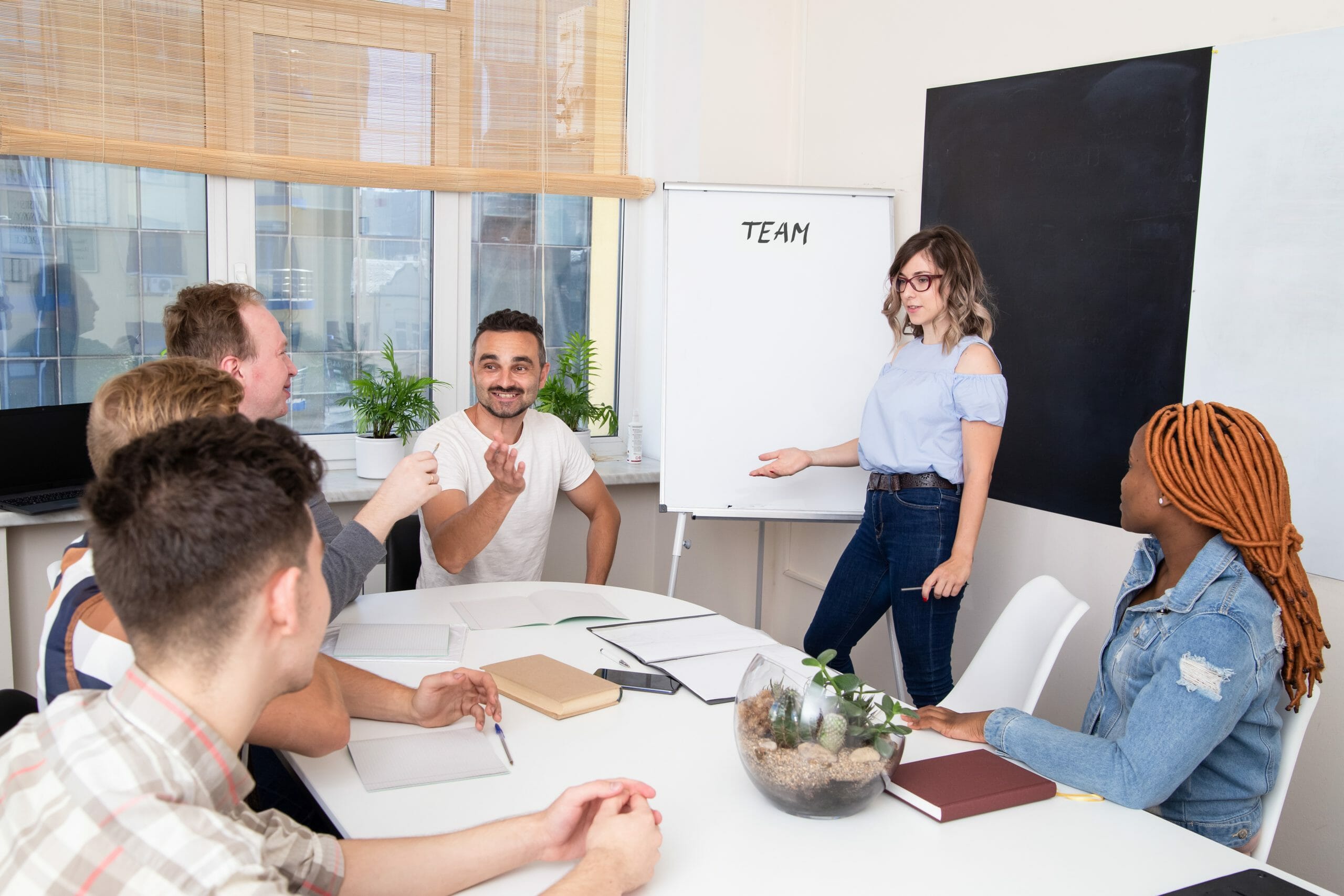 Group of project managers in higher education watching presentation