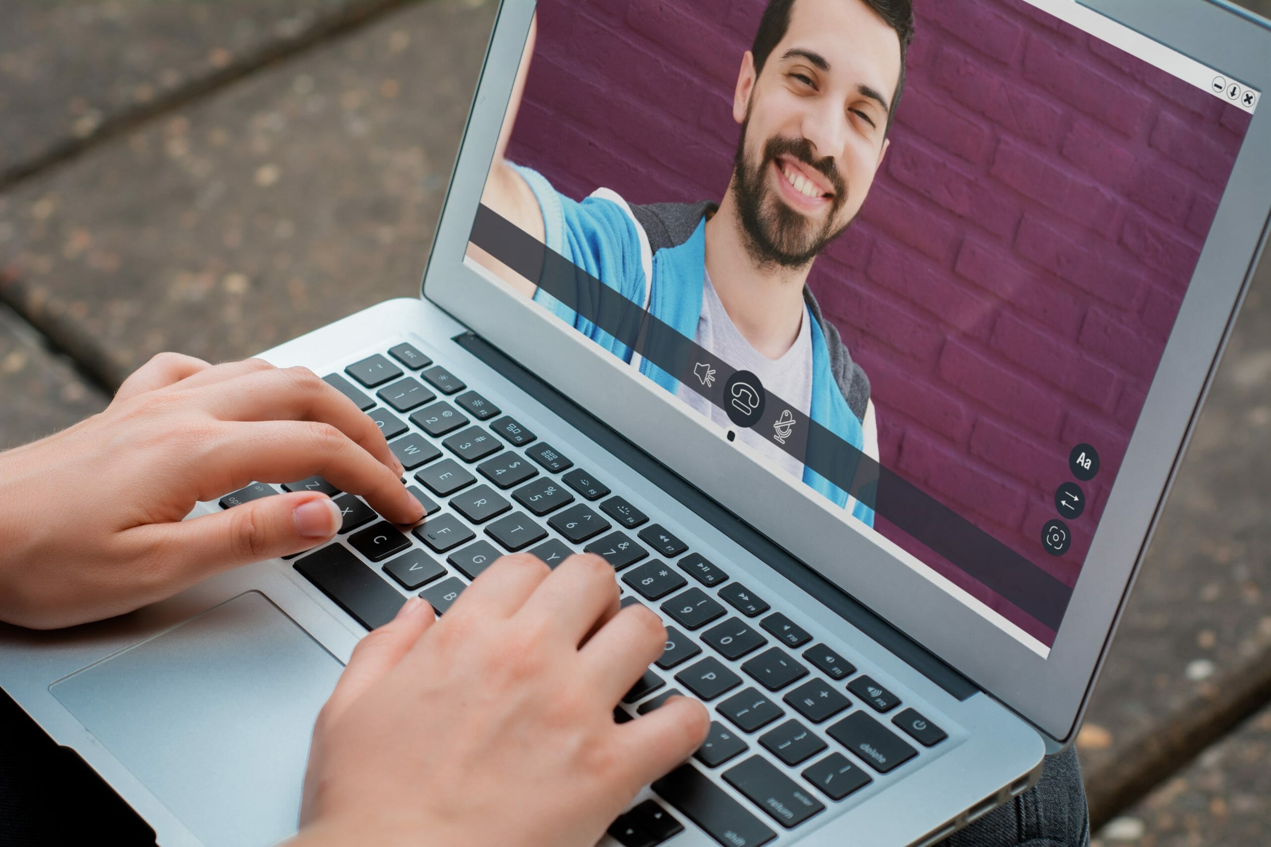 Closeup of woman chatting online with her friend