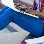 Student sitting with laptop