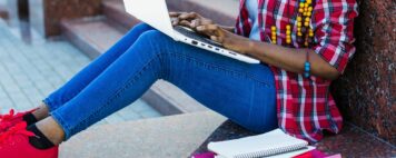 Student sitting with laptop