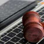 Gavel on laptop