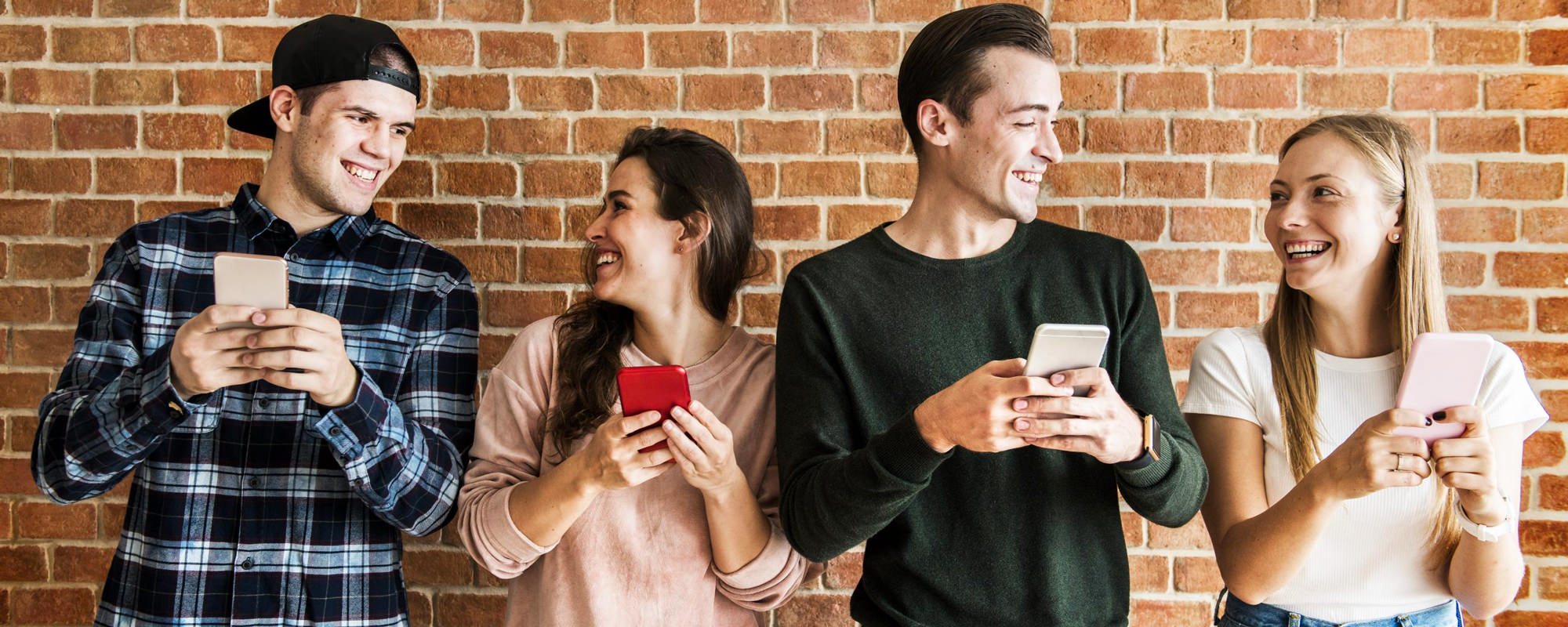 gen-z students looking at phones