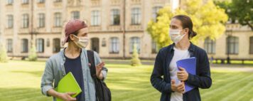 Two students wearing masks