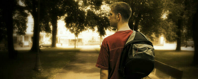 Student walking with a backpack