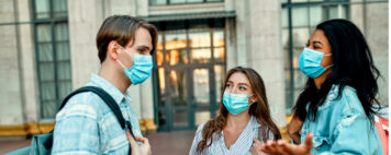 Student on campus wearing masks