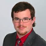 Professional portrait of Adam J. Raab