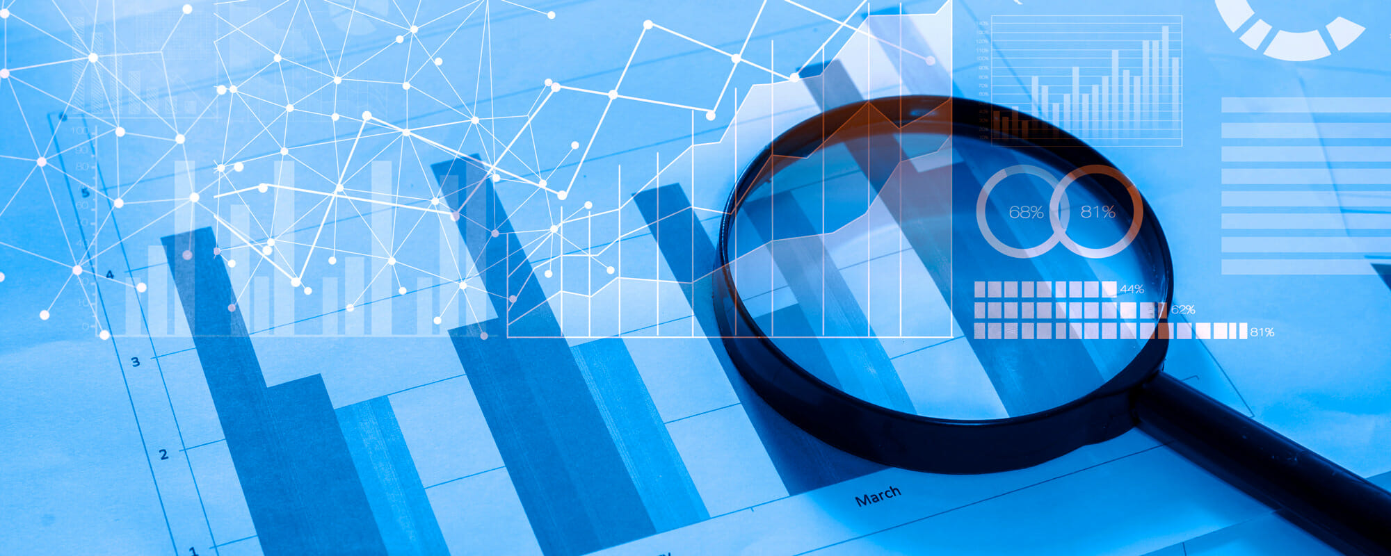 analyzing-data magnifying glass and data charts