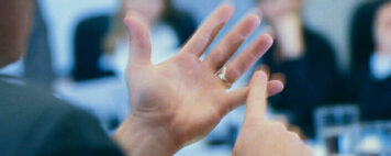 An image showing someone counting on their fingers.