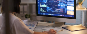 Woman analyzing data on a computer