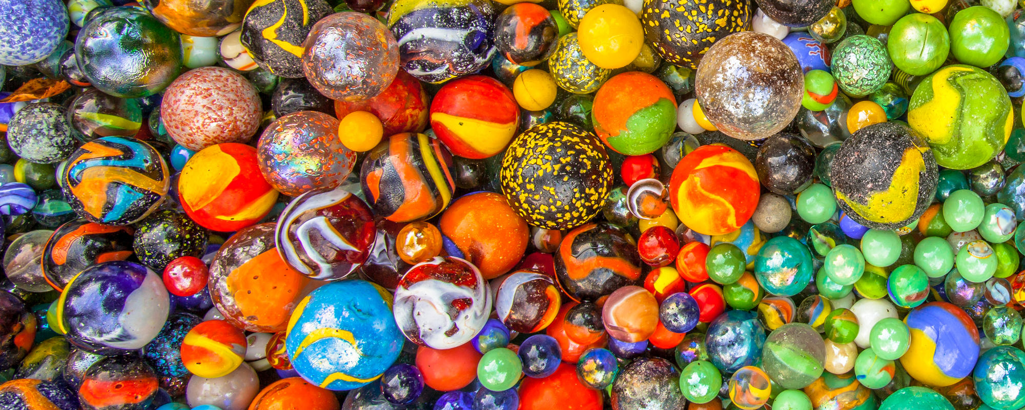 Different colored and sized marbles