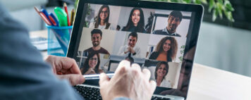 Video call with other professionals on a laptop