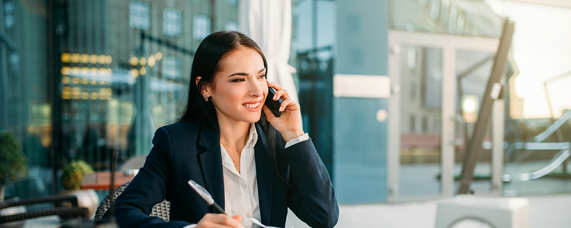 Business woman talking on a mobile phone
