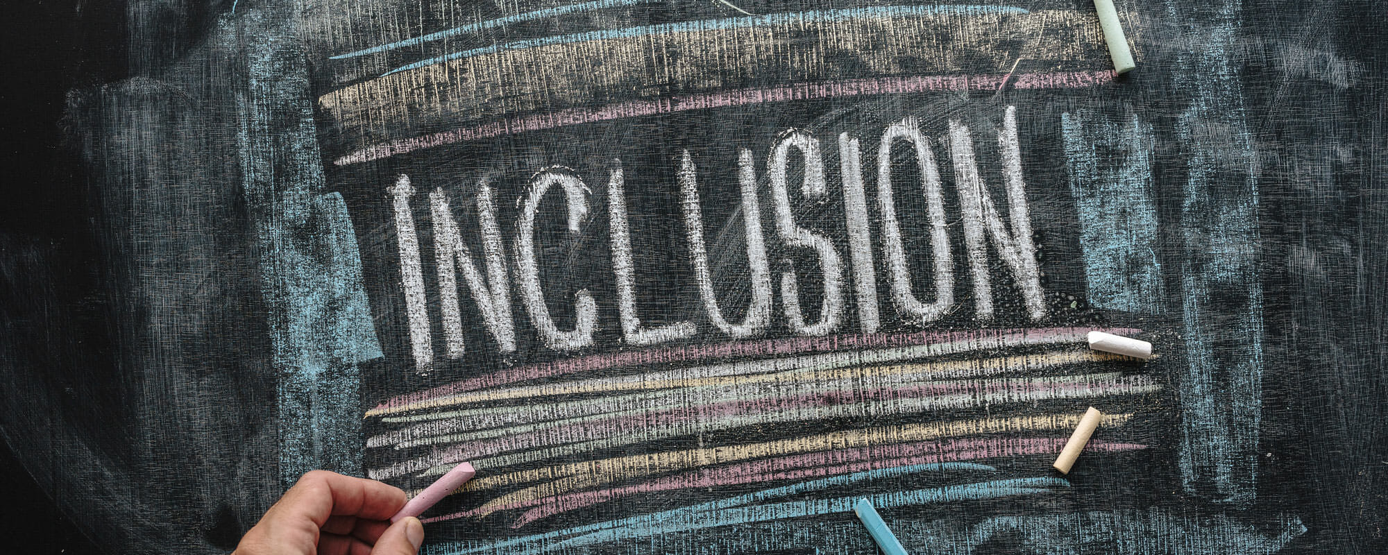 inclusion-on-chalkboard Inclusion written on chalkboard