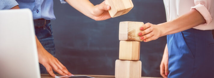 Team stacking building blocks