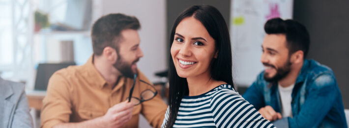 Young professional woman enjoying work