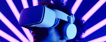 Person wearing VR set with futuristic background