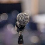 Microphone in front of an empty room
