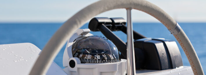 Boat steering wheel and compass