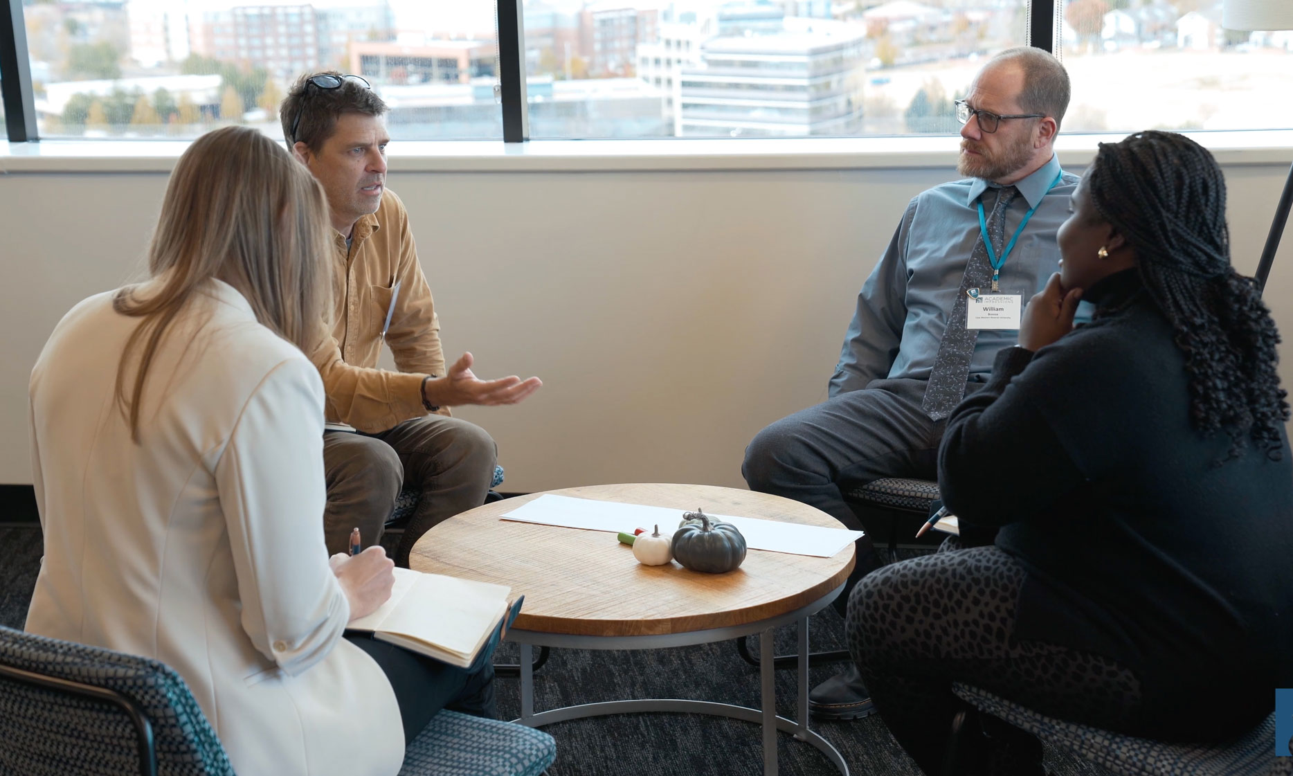 five-paths-6 Attendees having a discussion at an Academic Impressions Workshop